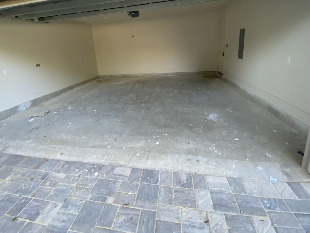 Bare concrete garage before coating