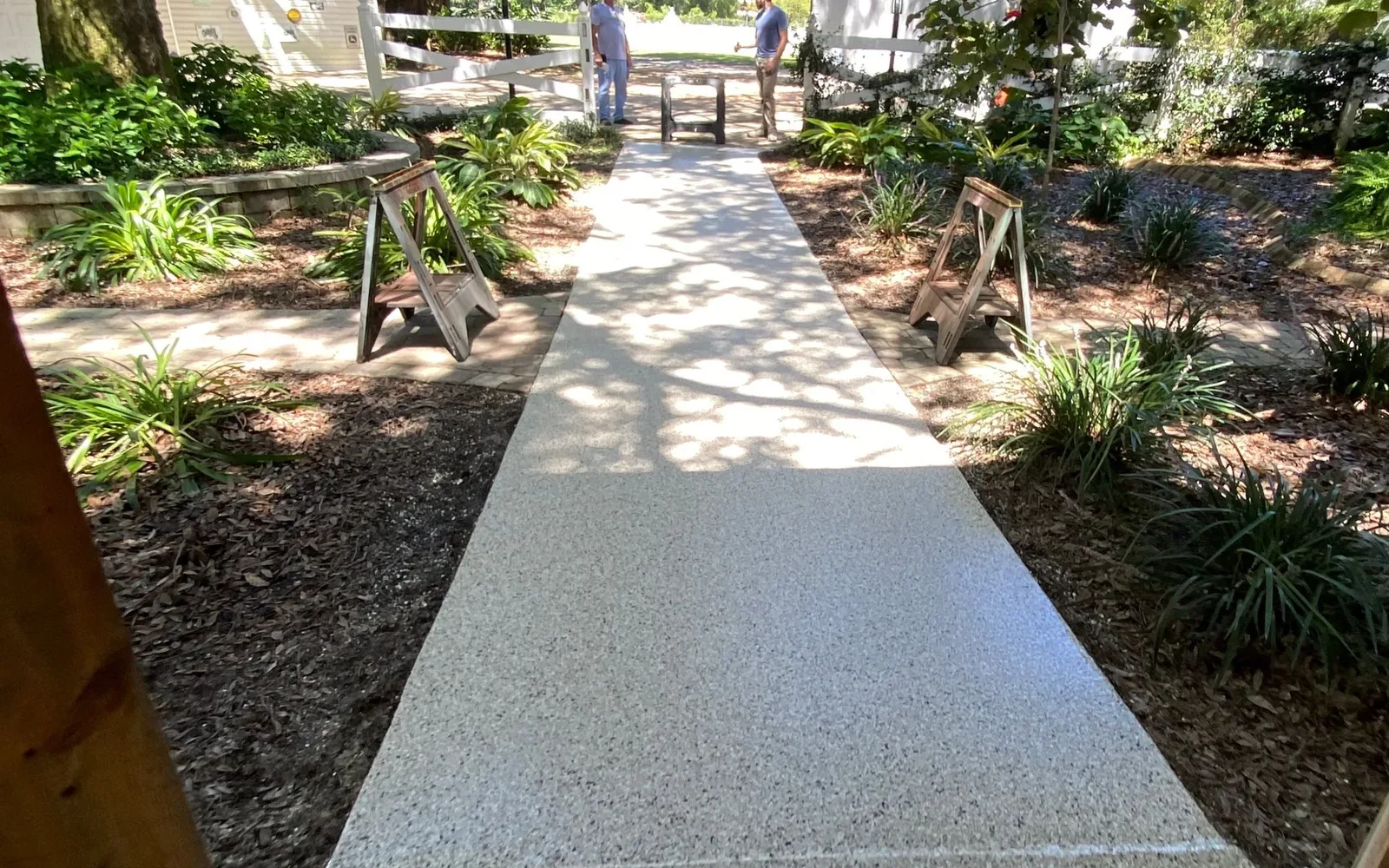 Flake-coated walkway after coating in Pace